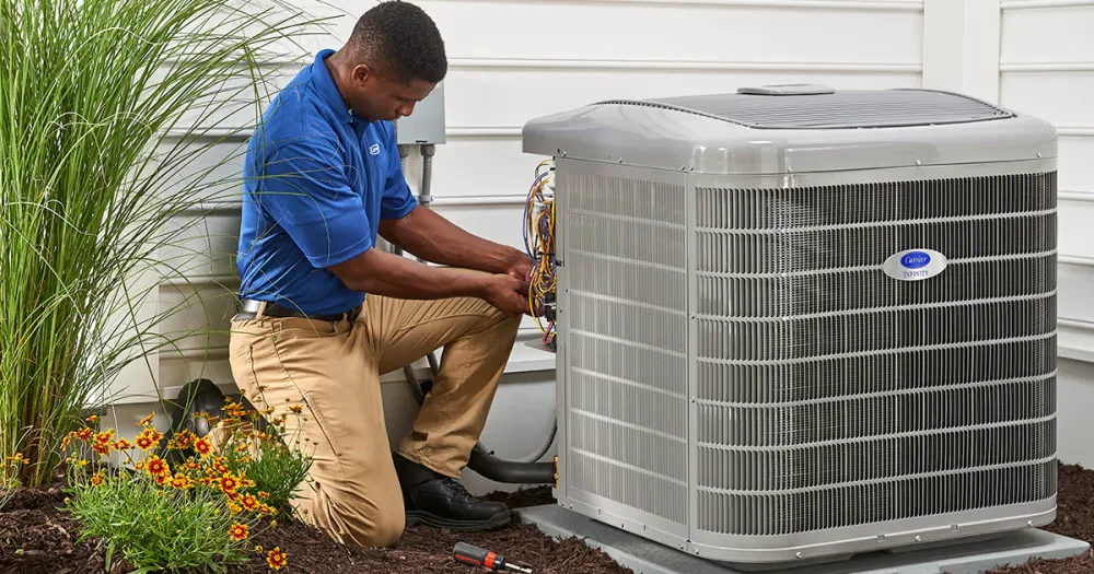 AceComfort technician diagnosing central AC issue Vancouver